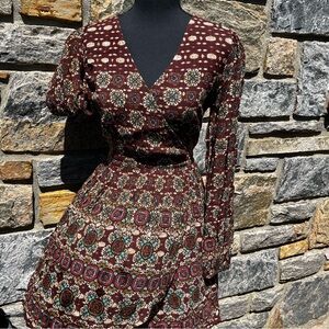 Ornate long sleeve dress